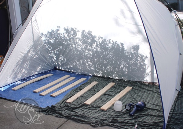 Spray Painting in Driveway using Spray Shelter