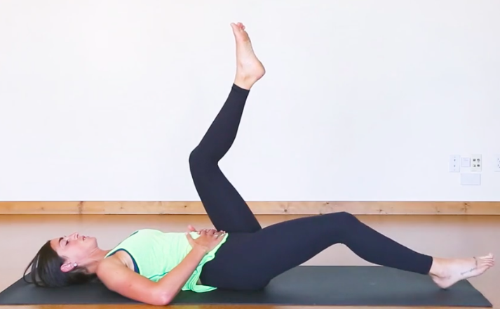 lying leg raise core exercise