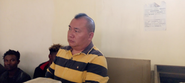 LI JIANHAU in Kibera court