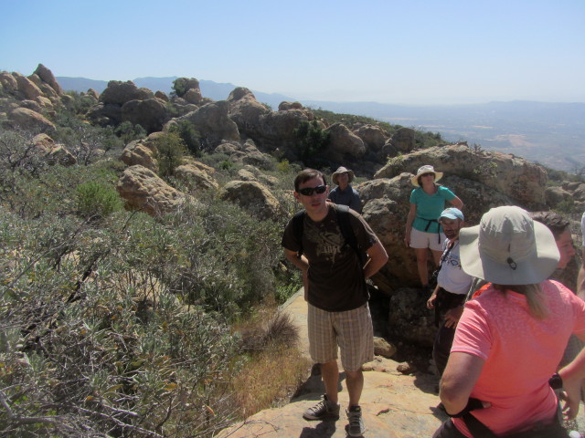 faces pointed in many directions among rocks