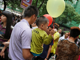 little boy holding a balloon in Shenzhen
