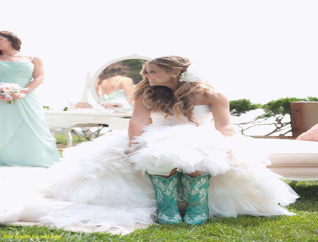 Many couples do two series of shots, one with the bride in  - Western Style Wedding Dresses With Cowboy Boots