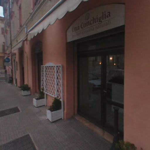 Una Conchiglia Negozio Ristorante