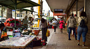 Durbanites go about their shopping with precaution in Durban's CBD.