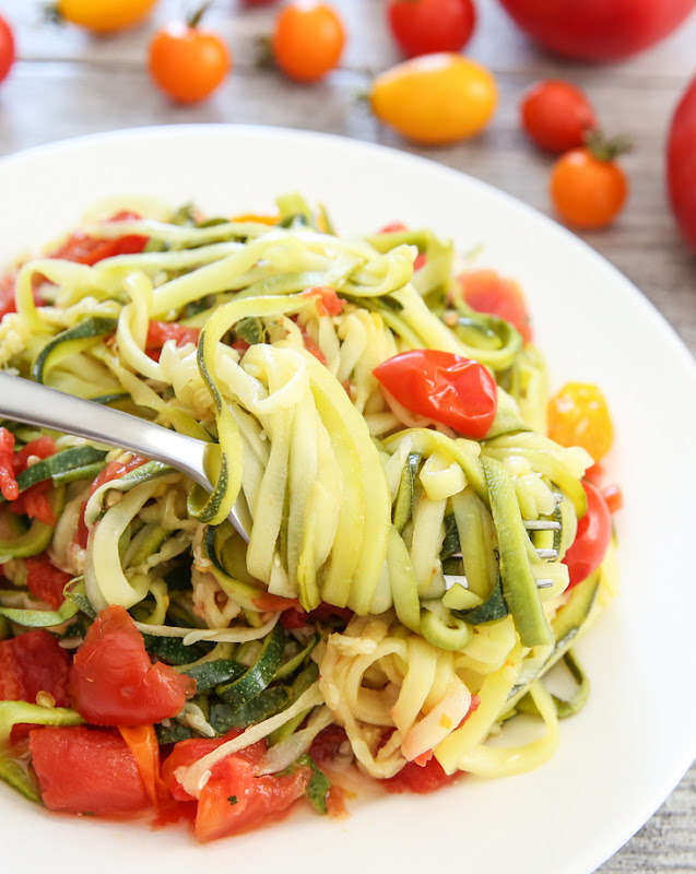 overhead photo of zucchini noodles twirled on a fork