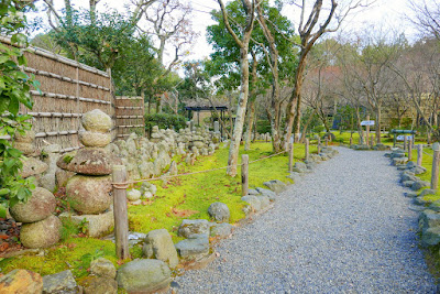 Adashino Nenbutsuji Temple in the Arashiyama District, a temple dedicated to the repose of souls who have died without families to remember them. The hundreds of stone buddhas and towers here are dedicated to the nameless deceased through the hundreds of years that are scattered and buried in the fields and mountains of Adashino