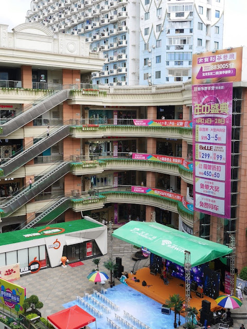 central outdoor area of the Baolong City Plaza shopping mall in Fuzhou, China