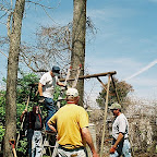 Click to Expand Owen climbs up to put a pulley and chain on his contraption