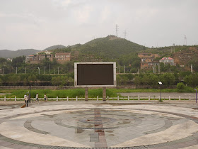 Large Turned-Off Screen at a riverside park in Gujiao, Shanxi