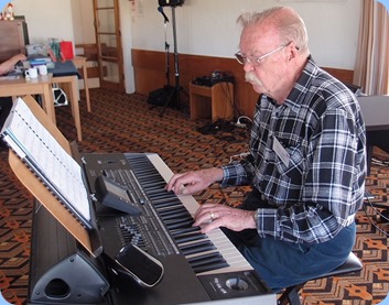 Colin Crann playing the Arrival Music on his Korg Pa3X (76 note). Colin also gave a 15 minute performance in the first half of the programme. Photo courtesy of Dennis Lyons.