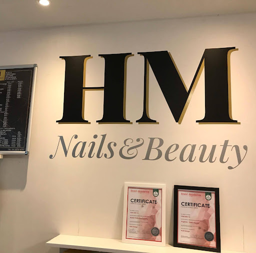 H-M Nails & Beauty logo