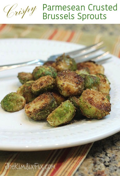 Crispy Parmesan Crusted Brussels Sprouts: An easy recipe since you par-bake the sprouts in the oven and finish them on the stove. No need to watch them they entire time. The crispy bread cumbs and salty cheese is a perfect addition to the soft savory Brussels Sprouts. #TheKimSixFix