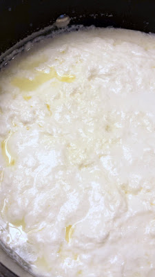 Making homemade ricotta- so easy, just whole milk, heavy cream, and a little acid via lemon juice or vinegar combined with heat. Here you can see the curds starting to separate