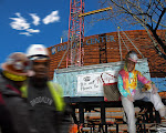DREAMSCAPE: Enelda is placed at Barclay Center where she did her finest work. Two construction workers are wearing her fashion visors. At her sibling, Bunnie DREAMSCAPE: Enelda is placed at Barclay Center where she did her finest work. Two construction workers are wearing her fashion visors. At her sibling, Bunnie