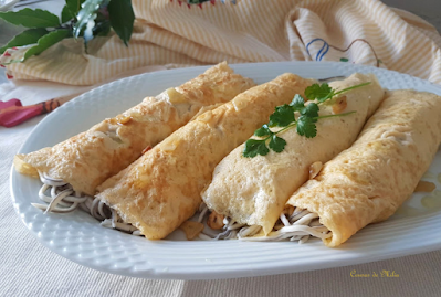 Rollitos rellenos  con gulas al ajillo