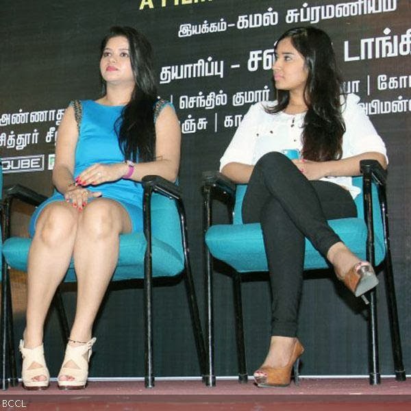 Preethi Das and Yasmine clicked on stage during the press meet of Marumugam, held in the city.