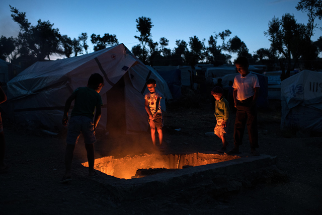 Young asylum seekers in Moria camp, on the Greek island of Lesbos, pictured in May 2018. Photo: Robin Hammond / Witness Change