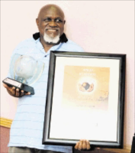 HARD WORKER: Mmipe George Mokgehle of Toronto Primary in Limpopo after winning this year's African ICT Achiever's Award on Saturday. Pic: Elijar Mushiana. 06/12/2009. © Sowetan.