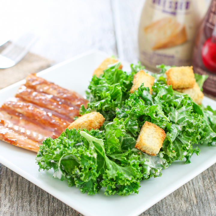 photo of a plate with salad and salmon