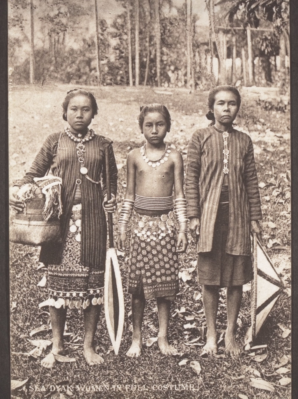  Sea Dayak  women in full costume BM Archives