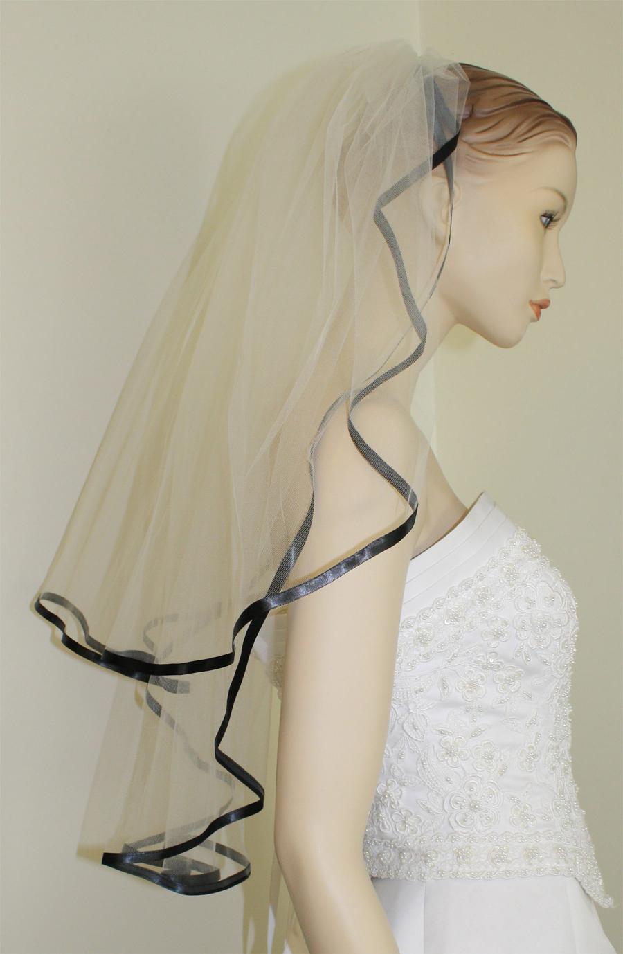 Ivory veil with black ribbon