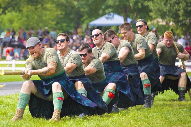 The Black Watch (Royal Highland) Regiment of Canada, pulling against the competition for the Highland Regiments tug-of-war trophy at the Glengarry Highland Games in Maxville Ontario