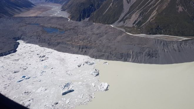 Aerial view of ice calving from the Tasman Glacier, New Zealand's largest. Photo: Richard Bottomley