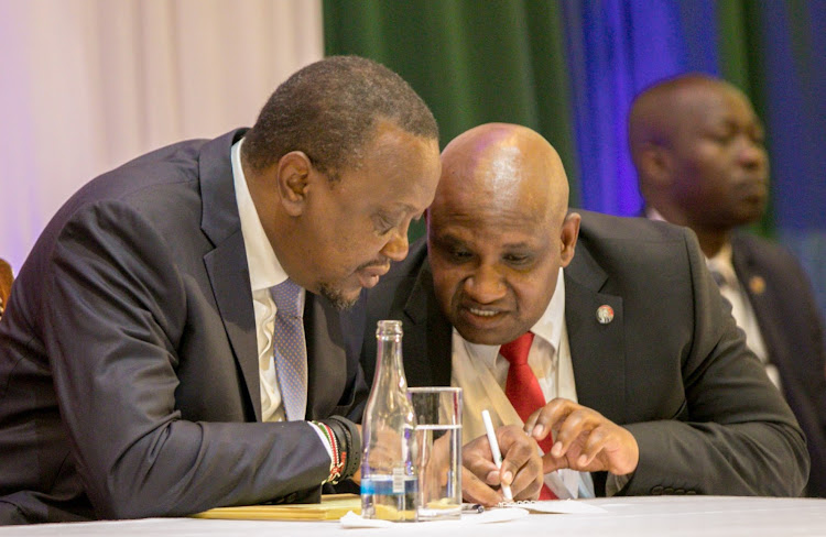 President Uhuru Kenyatta with KRA DG Githii Mburu at Safari Park Hotel in Nairobi on Tuesday, November 5, 2019, to preside over the 2019 annual Taxpayers Day.