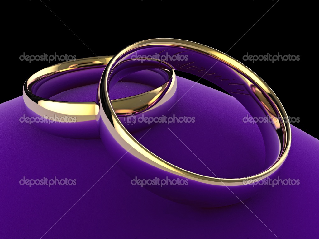 wedding rings on a purple