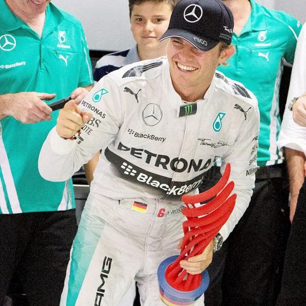 Mercedes driver Nico Rosberg of Germany dances to celebrate winning the German Formula One Grand Prix in Hockenheim, Germany, Sunday, July 20, 2014.