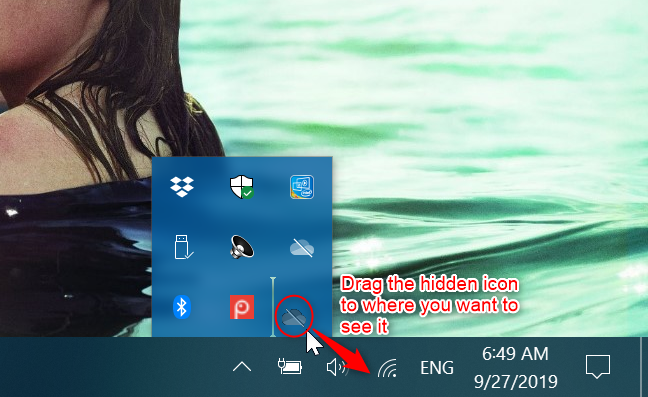 Trascinando l'icona di OneDrive nell'area di notifica