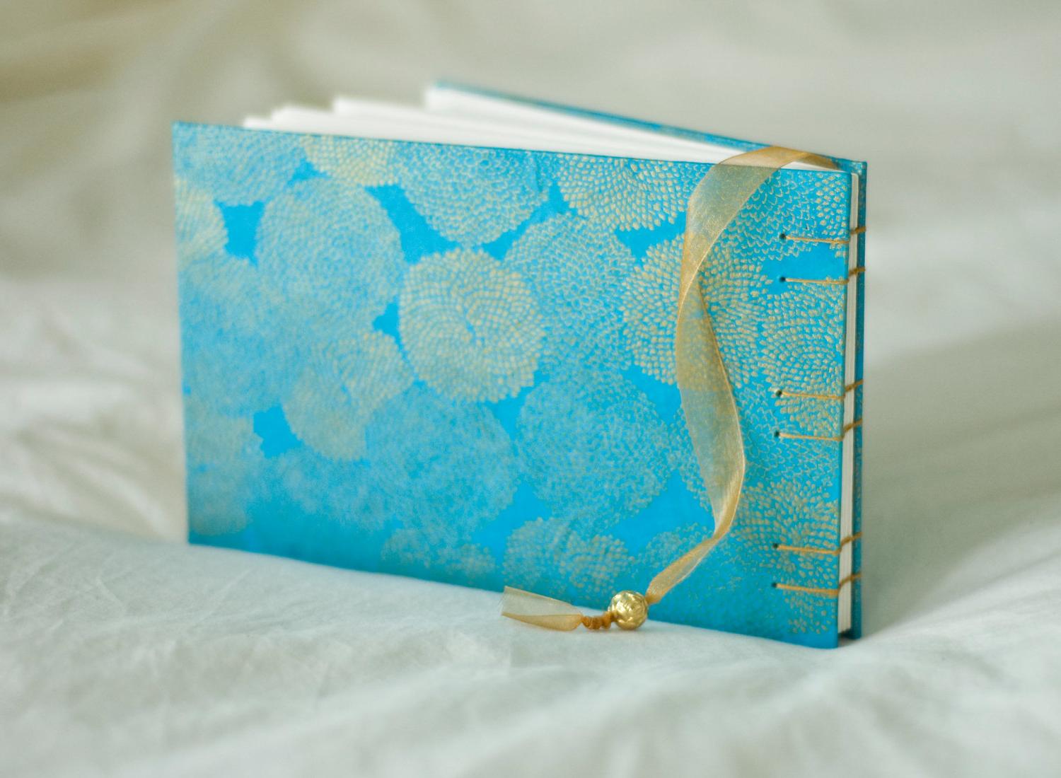 Peacock blue mums guest book