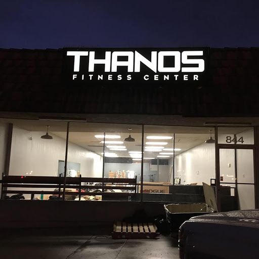 Thanos Fitness Center logo