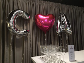 Red Scooter ceremony room, foil balloons in our initials and a pink heart 