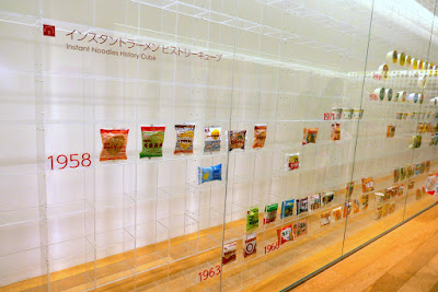 Momofuku Ando Instant Ramen Museum - the Instant Noodles History Cube shows the instant noodles lineup that started with the original Cup Noodles Chicken Ramen. Approximately 800 product packages shows how a single product grew to te 100 billion servings of instant noodles that are consumed every year around the world