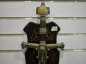 Star of David symbol on hilt of a sword for sale at Smart Wife Knives in Yangjiang, China