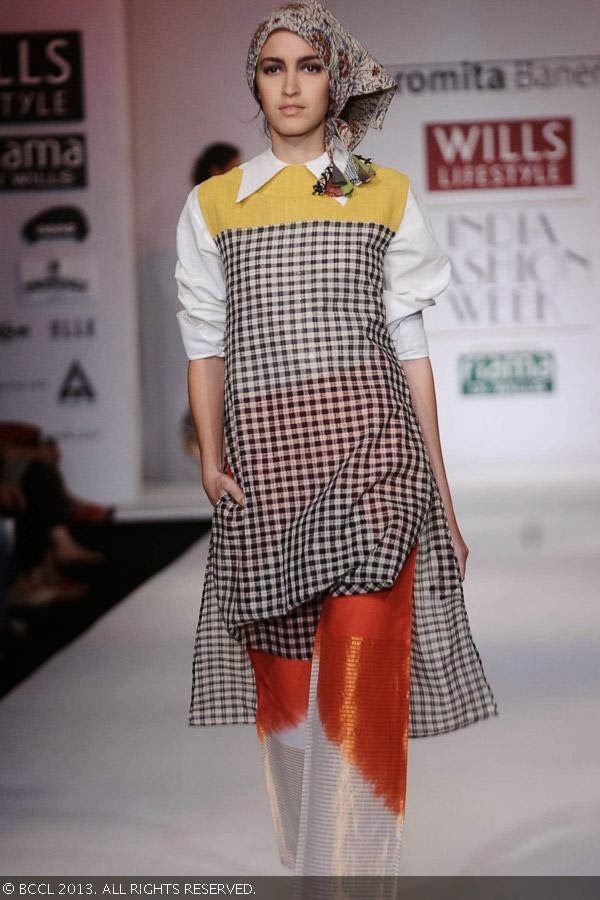 Marcela showcase a creation by fashion designer Paromita Banerjee on Day 2 of Wills Lifestyle India Fashion Week (WIFW) Spring/Summer 2014, held in Delhi.