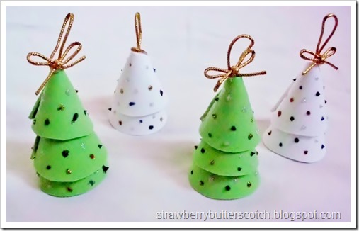 Little tree ornaments made with craft foam, glitter glue and gold cord.  Super easy.