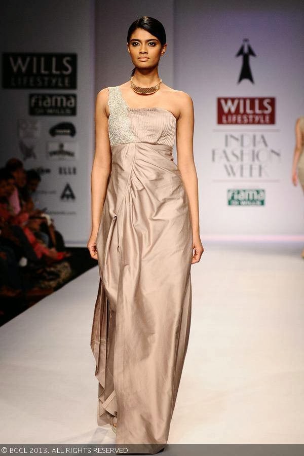 Archana walks the ramp for fashion designer Vedangi Agarwal on Day 5 of Wills Lifestyle India Fashion Week (WIFW) Spring/Summer 2014, held in Delhi.