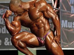 Sexy Competitive Male Bodybuilder Posing on Stage