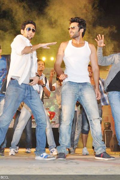 Jackky Bhagnani accompanied by a fan during 'Alegria Festival', held at Pillai College in New Panvel on February 1, 2013. (Pic: Viral Bhayani)