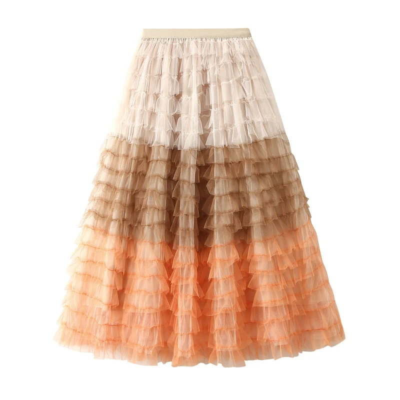Falda en forma de pastel de hilo de red con color degradado, vuelo multinivel, perfecta para un look elegante y moderno con movimiento.
