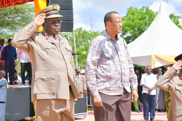 Garissa County Commissioner Boaz Cherutich and Garissa Governor Nathif Jama at Dadaab stadium during Madaraka day celebrations on June 1, 2023