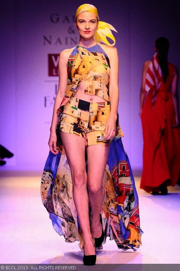 Polina showcases a creation by fashion designers Gauri and Nainika on Day 1 of Wills Lifestyle India Fashion Week (WIFW) Spring/Summer 2014, held in Delhi.
