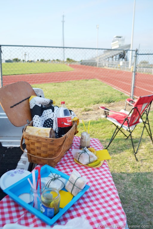 tailgate meal set up by football field