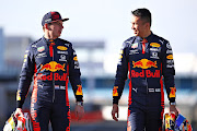 Red Bull Racing drivers Max Verstappen (left) and Alex Albon (right).