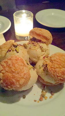 Cafe Castagna finishes with perfectly sized profiteroles with halva ice cream, honey and pistachio and chili, these are not listed on the dessert menu and are a special light dessert to end the Family Style Dinner