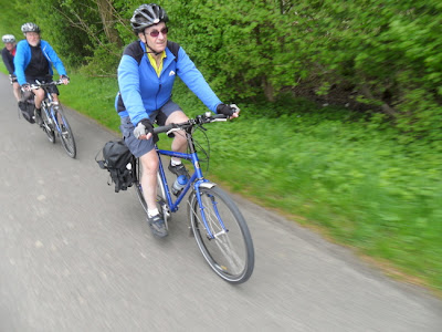 Cyclist riding towards camera