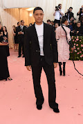 Trevor Noah in a T-shirt reading 'This is all a formality' at the 2019 Met Gala.