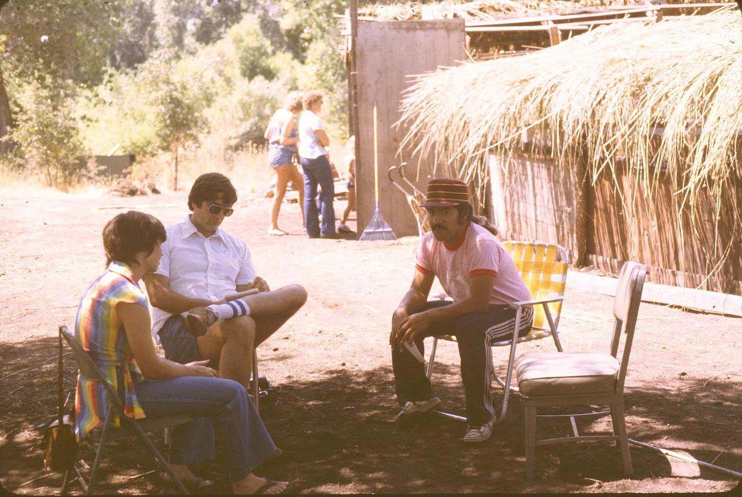 Jim Brown, next to the arbor